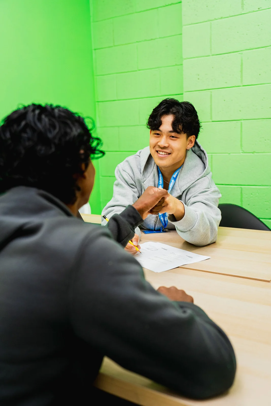 An Everest tutor working one on one with a student